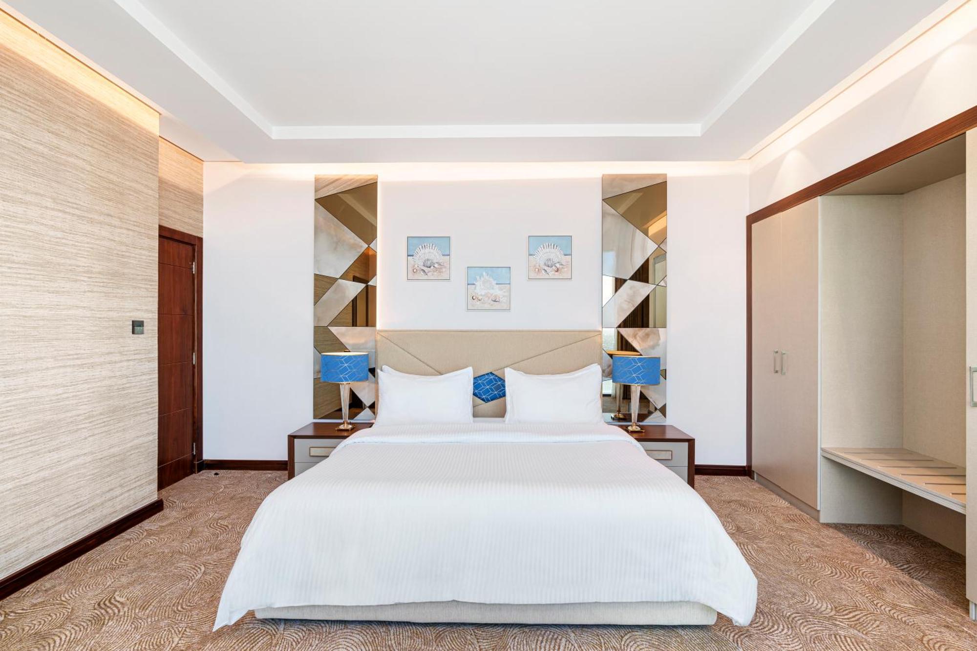 Rixos Premium Alamein El Alamein Camera foto A bedroom at the hotel